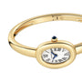 The Cartier Baignoire (Size 15) is a yellow gold watch bangle with an oval face, Roman numerals, a blue gemstone crown, and precise quartz movement, displayed against a white background.