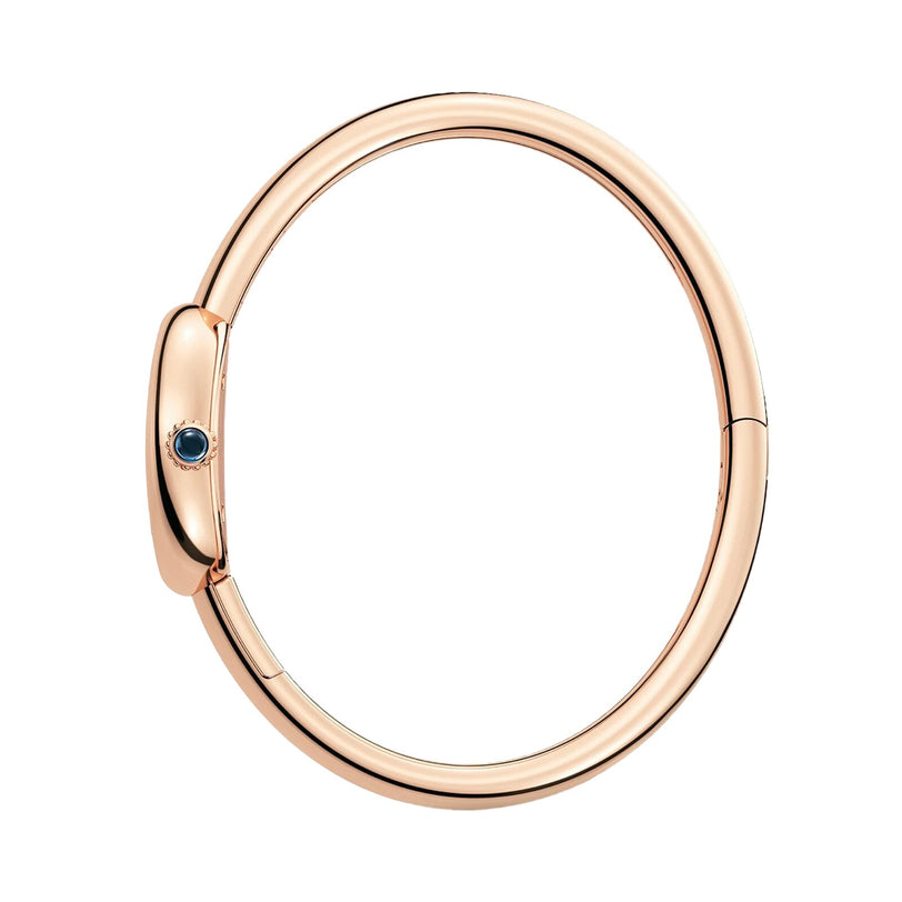 The Cartier Baignoire (Size 17) rose gold bangle features a small blue gemstone accent on the clasp, shown against a white background.