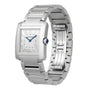 The Cartier Tank Française is a stainless steel luxury watch featuring a square face, Roman numerals, blue hands, and a metal link bracelet, displayed against a white background.