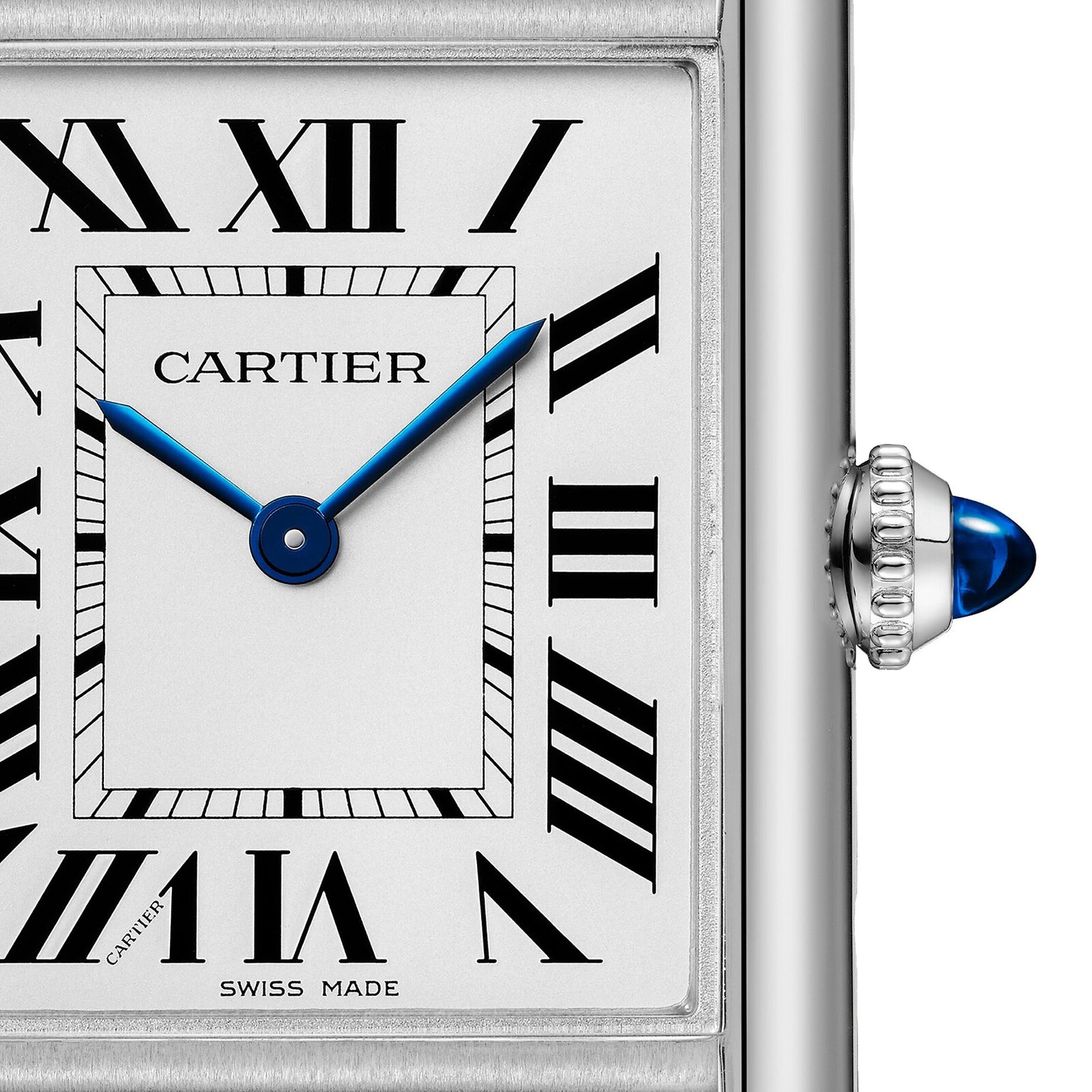 Close-up of the Cartier Tank Must Solarbeat™ Watch face with Roman numerals, blue hands, a steel case, and a blue cabochon crown—timeless elegance from Cartier in every detail.