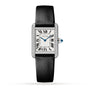 The Cartier Tank Must de Cartier wristwatch features a rectangular steel case, black strap, diamond-set bezel, white dial with black Roman numerals, and blue hands.