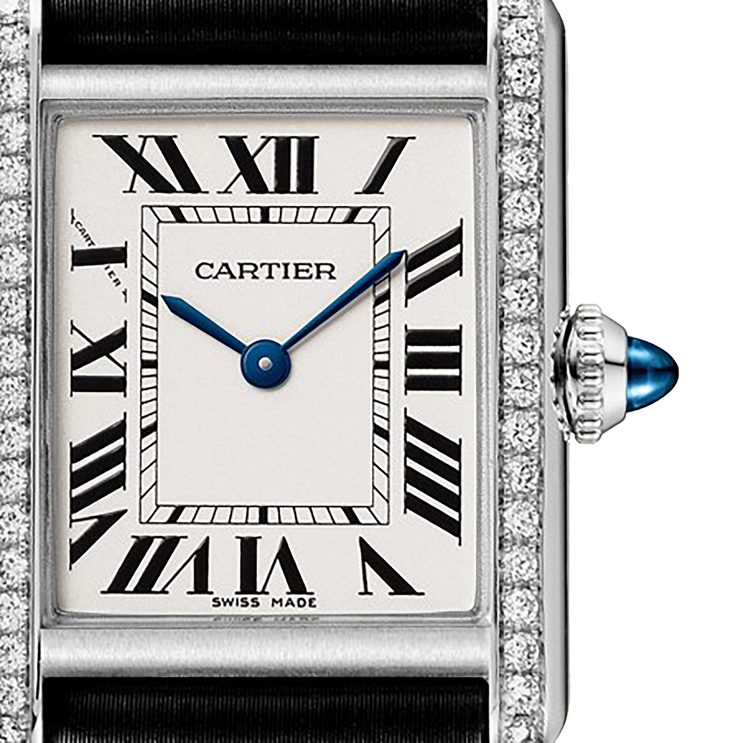 Close-up of the Cartier Tank Must de Cartier watch face, featuring Roman numerals, blue sword-shaped hands, a diamond bezel, steel case, and a crown set with a blue cabochon.