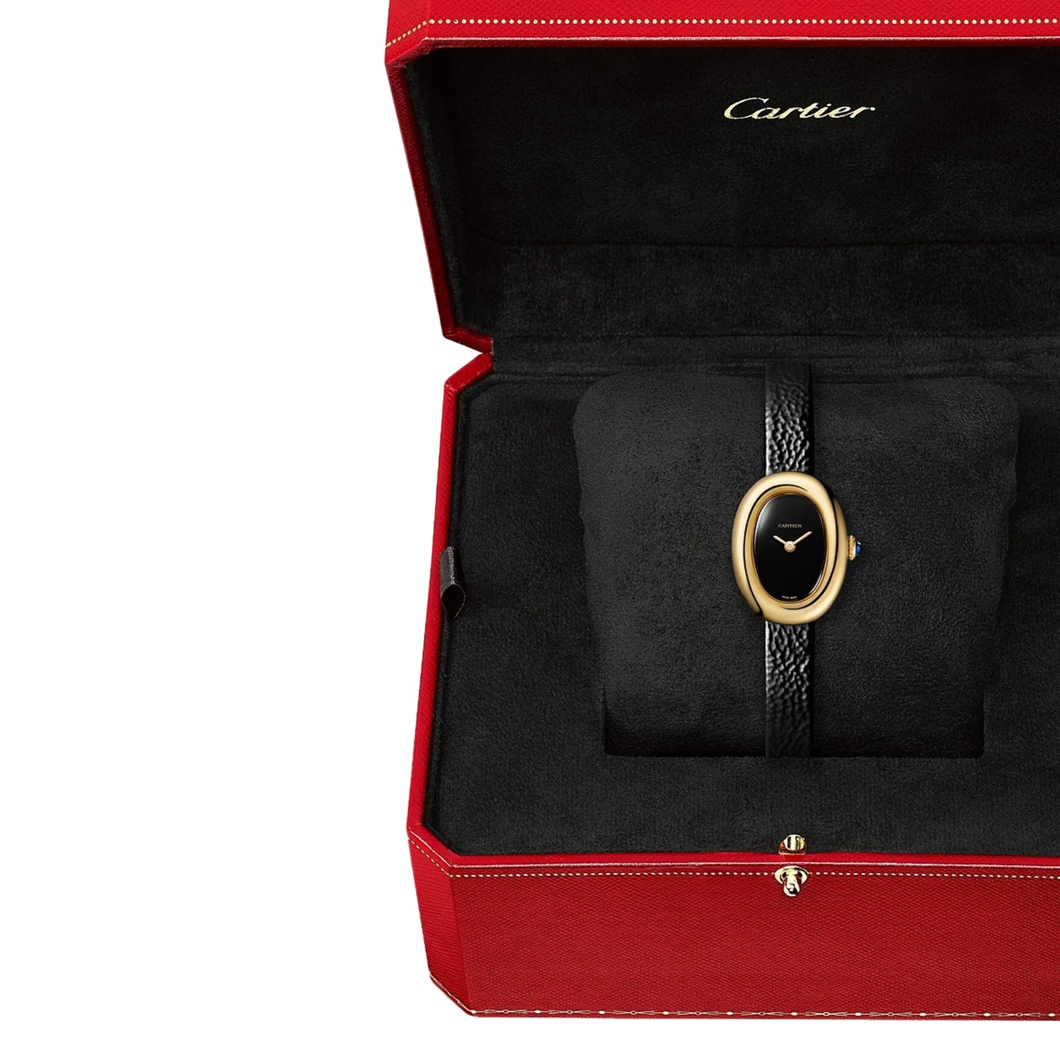 A Cartier Baignoire watch with a black strap and gold oval face, presented in a red Cartier box.