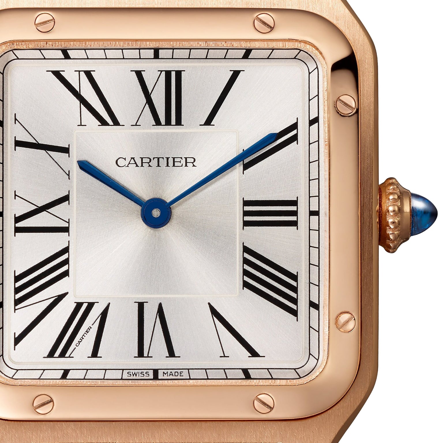 Close-up of a Cartier Santos-Dumont watch featuring a square 18K rose gold case, Roman numerals, blue hands, gemstone-set crown, and an alligator leather strap.