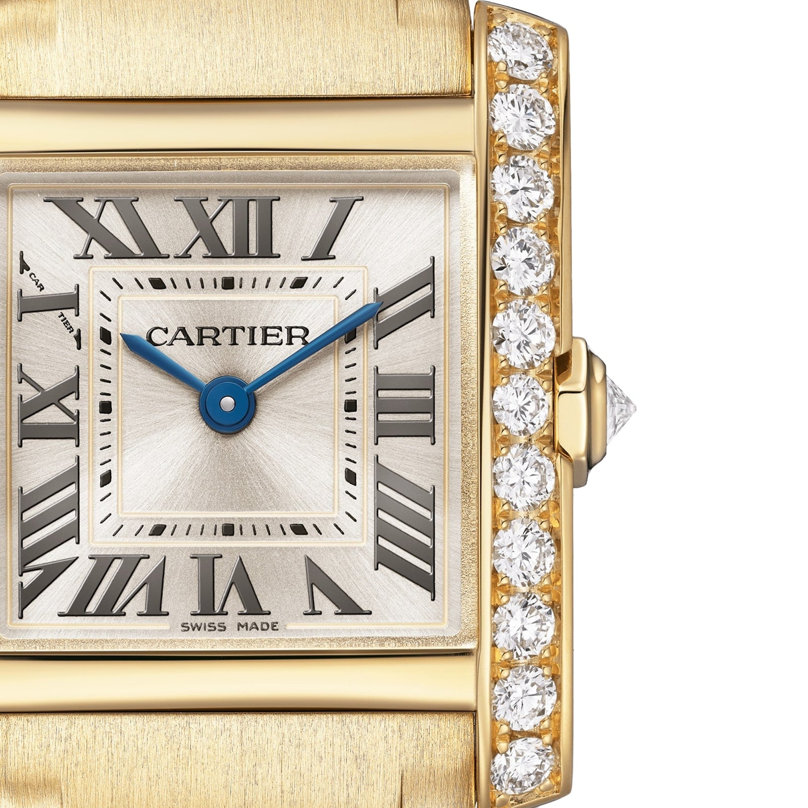 Close-up of the Cartier Tank Française watch, featuring a yellow gold case, Roman numerals, blue hands, and a brilliant-cut diamond-encrusted bezel on the right side of the face.