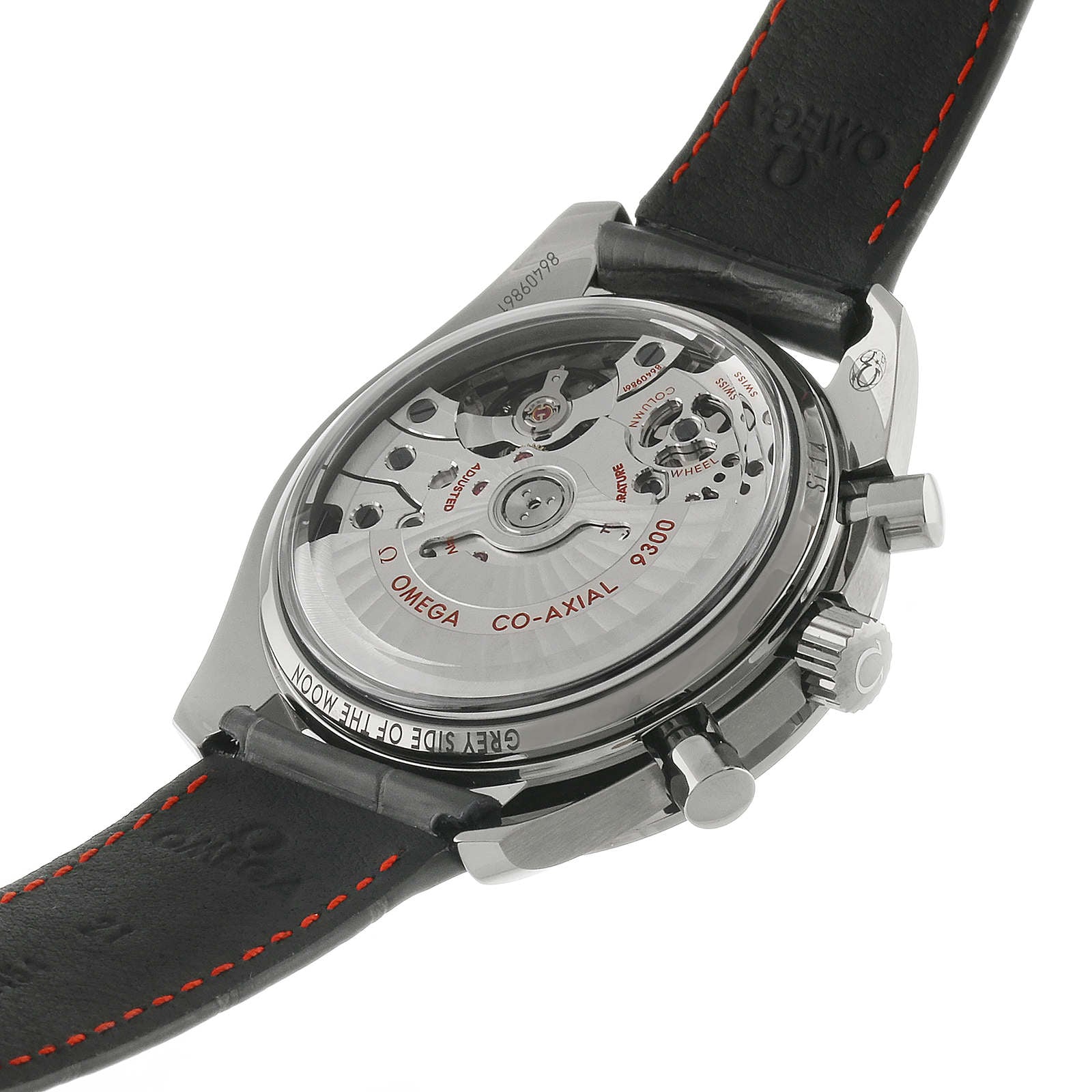 Back view of the OMEGA Speedmaster Dark Side of the Moon Grey Side Edition, showing the exposed Co-Axial calibre 9300 movement and inscriptions on the case and black leather strap with red stitching.