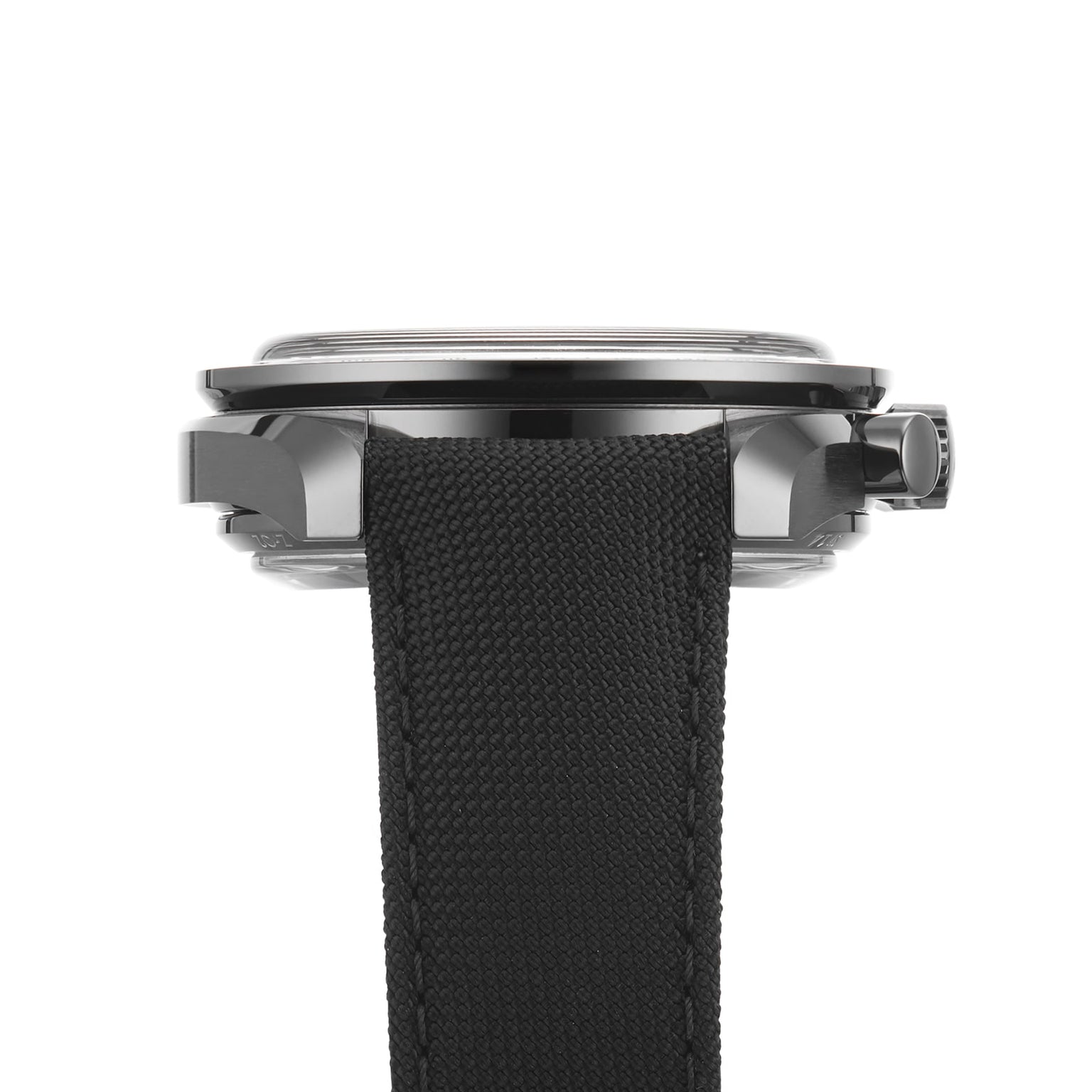 Side view of the OMEGA Speedmaster Dark Side of The Moon Ceramic with a black fabric strap and metallic case, featuring the crown on the right—a true Lunar Legacy icon.