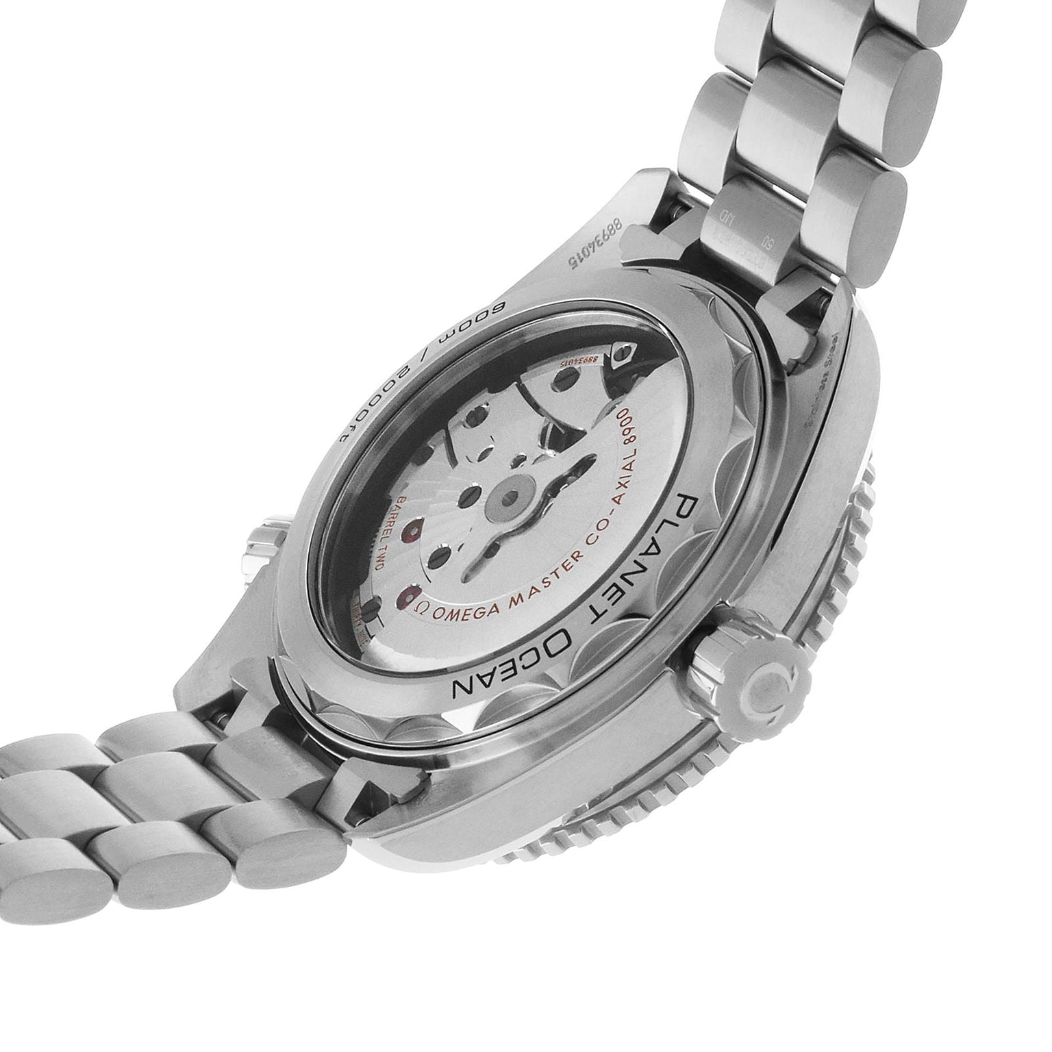 Close-up of the OMEGA Seamaster Planet Ocean 600M’s back, showcasing its silver case, bracelet, and the Master Chronometer automatic movement visible through the transparent caseback.