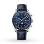 A blue OMEGA Speedmaster Moonphase wristwatch with a chronograph, moonphase indicator, and black leather strap is shown on a white background.