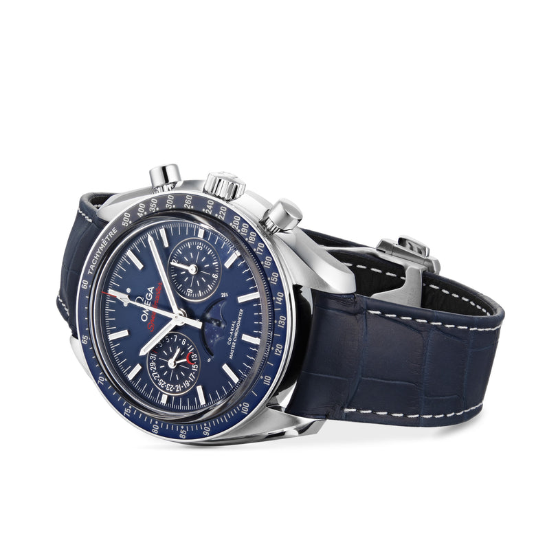 The OMEGA Speedmaster Moonphase, featuring a blue chronograph dial, silver markers, blue leather strap, and Master Chronometer certification, is displayed angled on a white background.