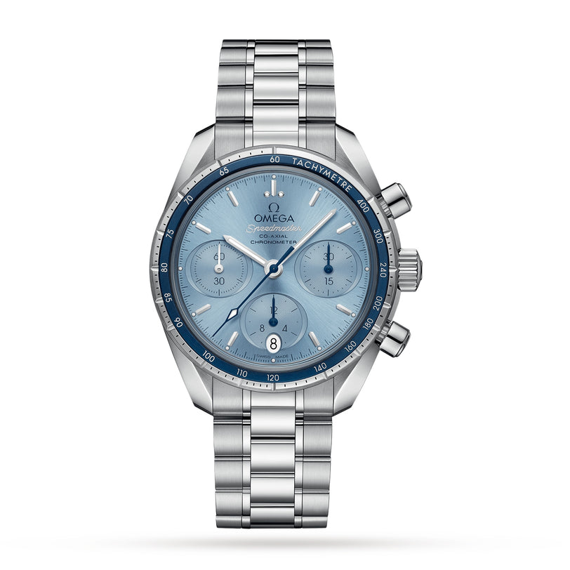 An OMEGA Speedmaster 38 wristwatch in stainless steel features a blue dial with three subdials, date display, and tachymeter bezel on a metal bracelet, powered by the 3330 calibre movement and shown against a white background.