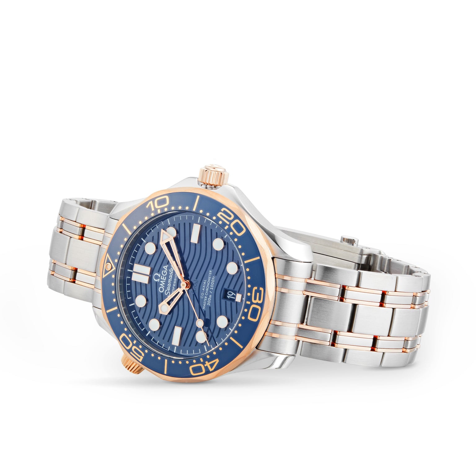 An OMEGA Seamaster Diver 300M wristwatch in silver and rose gold features a blue face, gold bezel markings, and a stainless steel bracelet, shown on a white background.