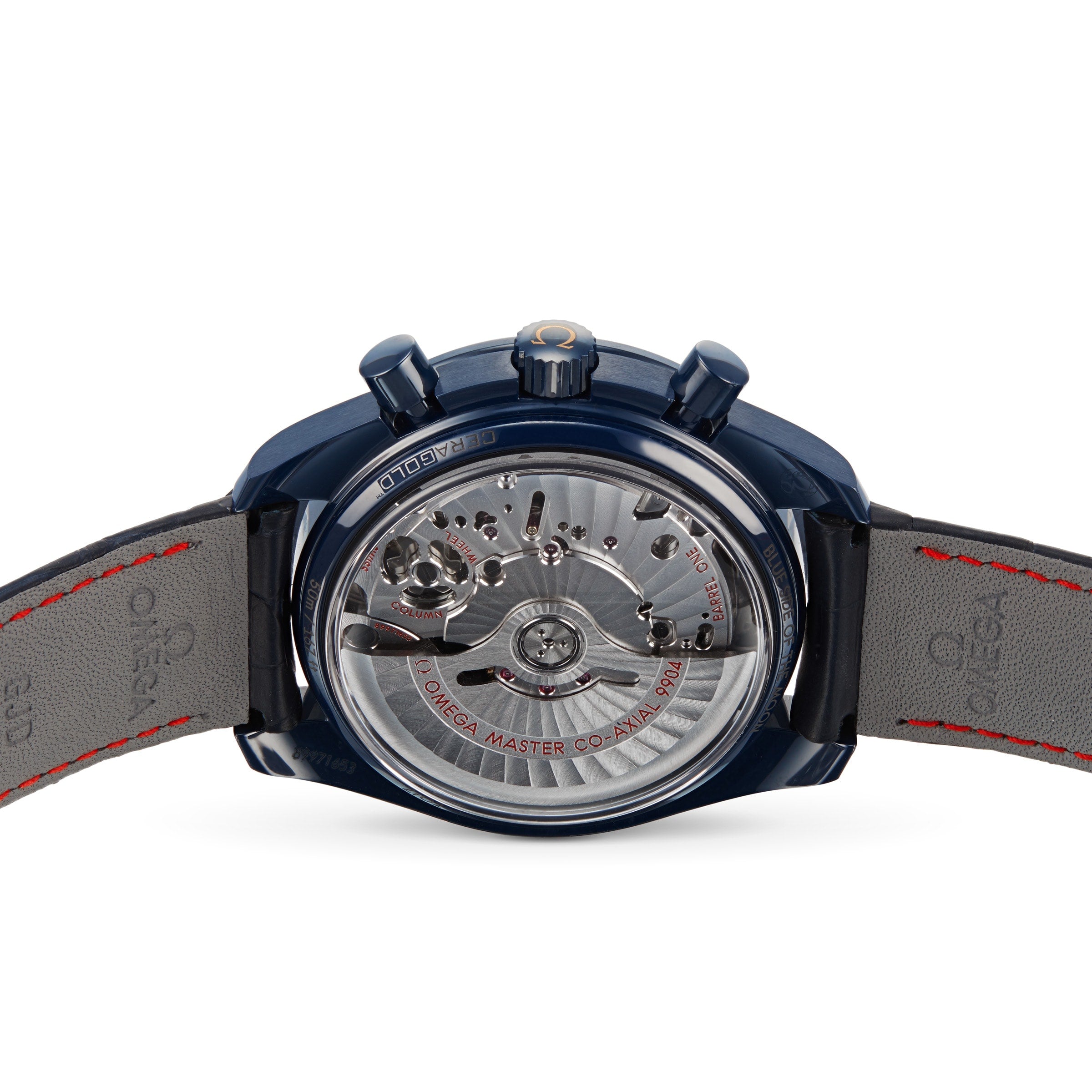 Close-up of the back of an OMEGA Speedmaster 44 Ceramic, with a blue case and transparent back revealing the movement and Master Co-Axial engraving, on a gray leather strap with red stitching.