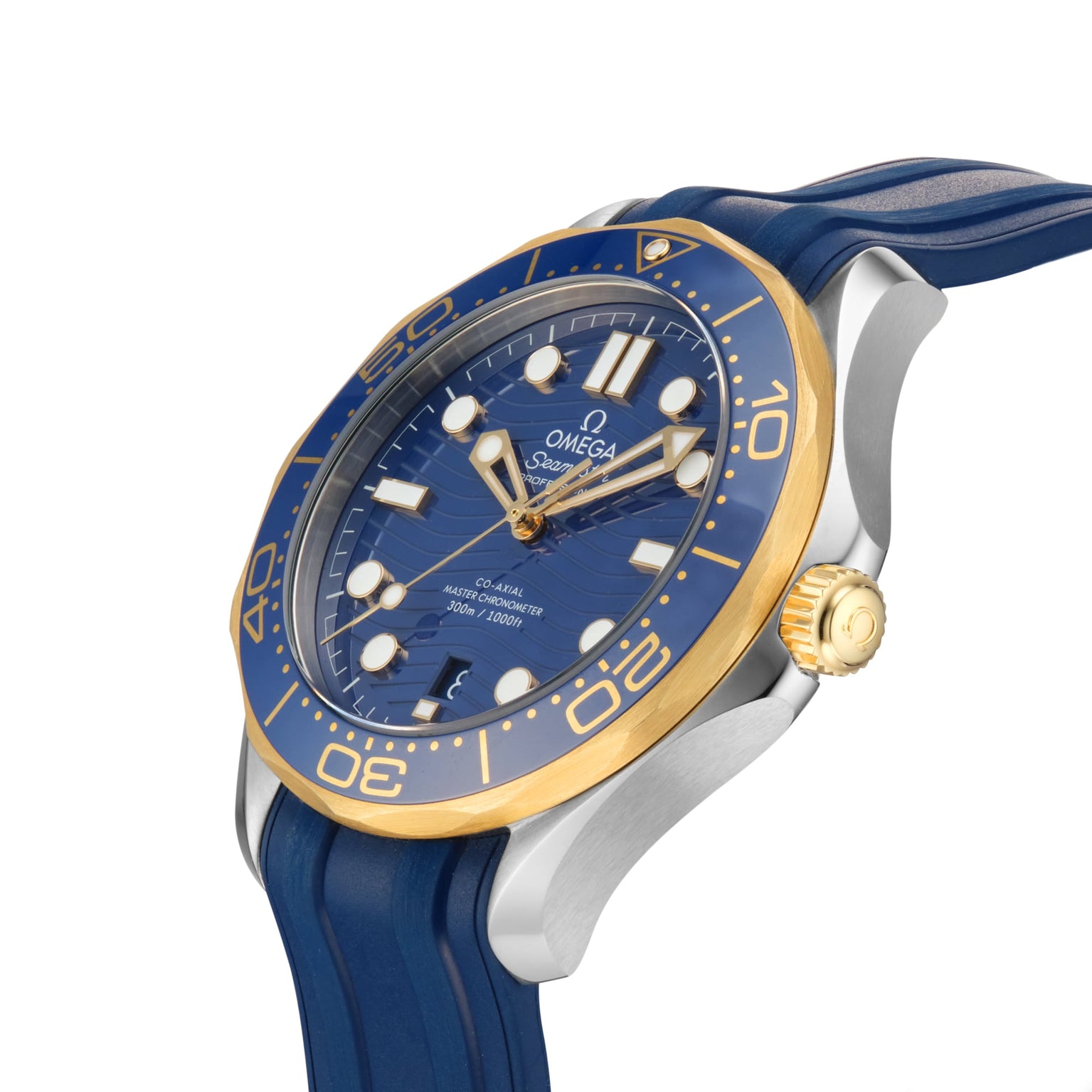 A close-up of an OMEGA Seamaster Diver 300M watch with a blue and gold bezel, blue dial, gold accents, and a blue rubber strap, highlighting the precision engineering of its 8800 calibre movement.