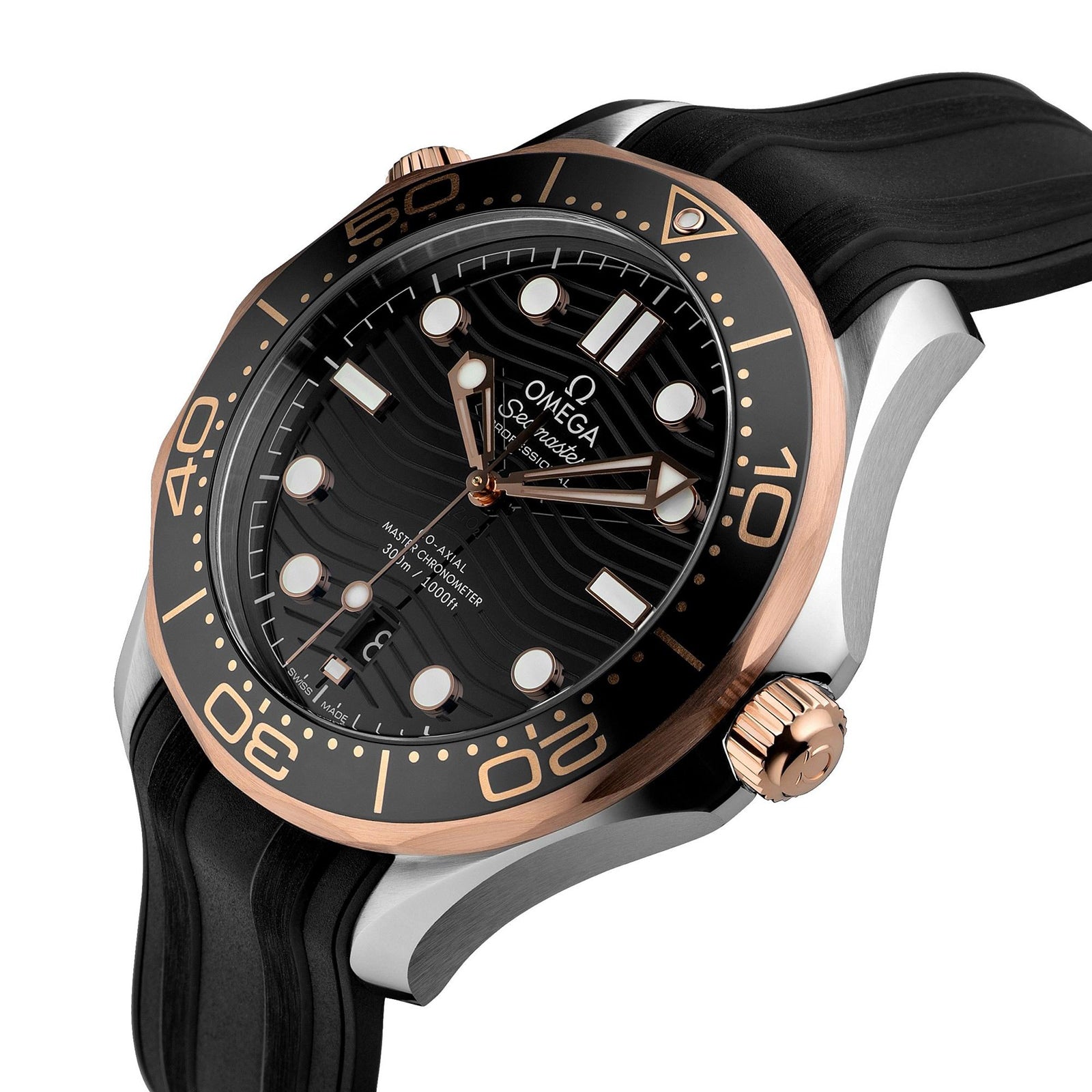 The OMEGA Seamaster Diver 300M is a black dive watch with a Ceragold black and rose gold bezel, black dial with white markers, Master Chronometer certification, and a sleek black rubber strap.