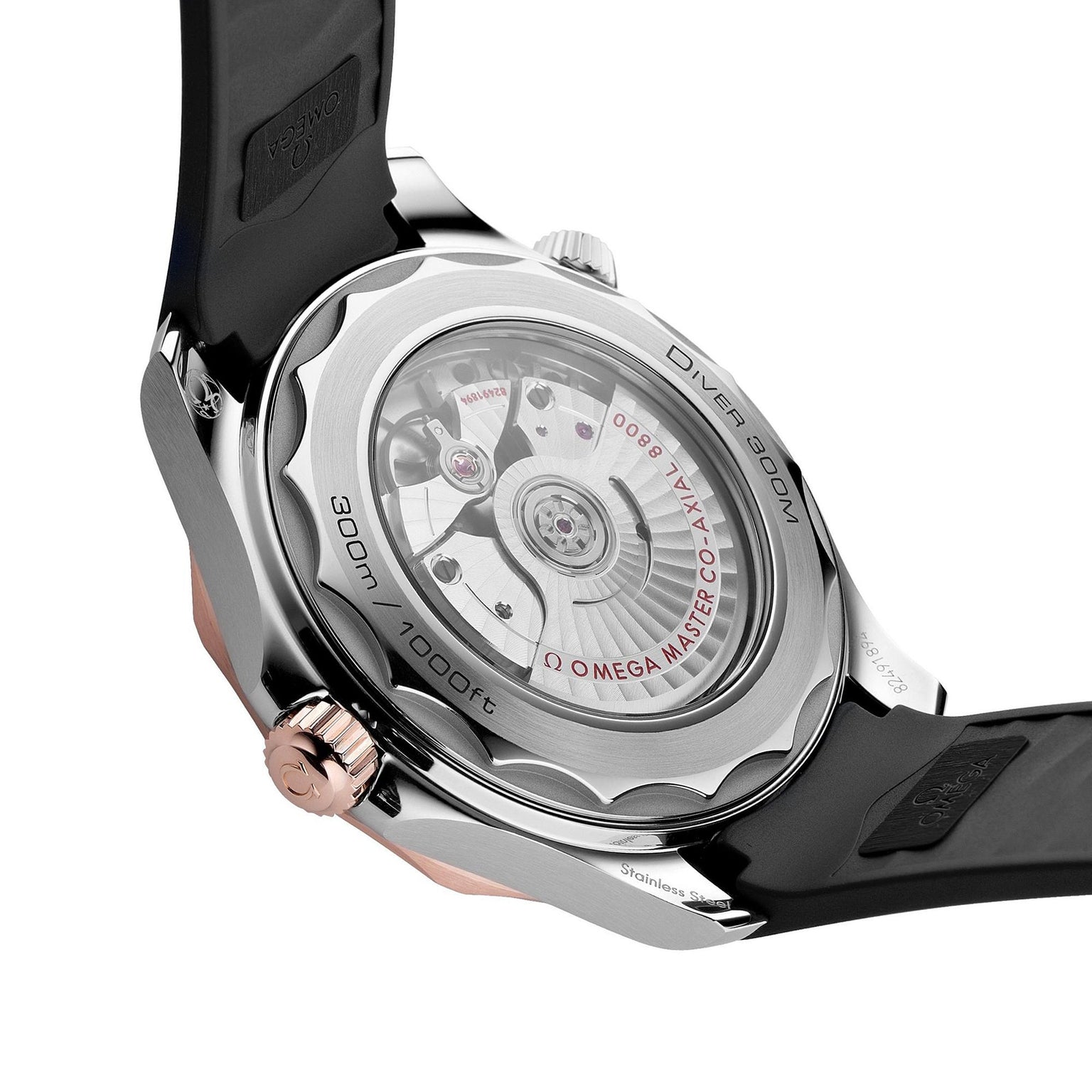 Close-up of the back of an OMEGA Seamaster Diver 300M, highlighting its transparent case back and intricate mechanical movement.