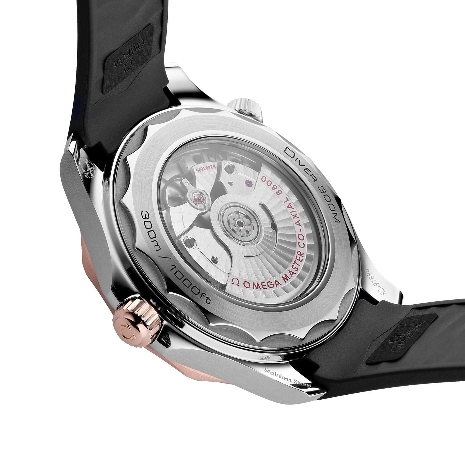 Close-up of the back of an OMEGA Seamaster Diver 300M, highlighting its transparent case back and intricate mechanical movement.