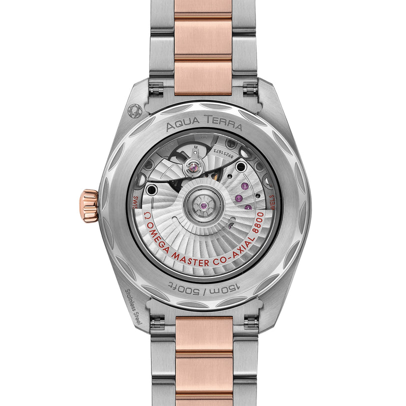 Close-up of the back of the OMEGA Seamaster Aqua Terra 150M, highlighting its exposed calibre 8800 movement and a silver and rose gold two-tone bracelet—a tribute to OMEGAs maritime legacy.