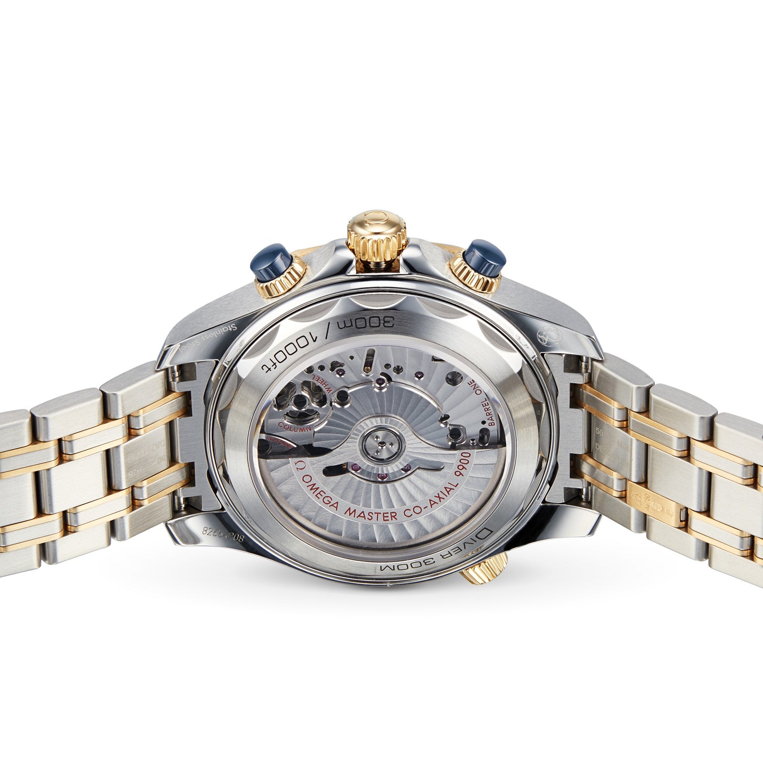 Close-up of the back of an OMEGA Seamaster Diver 300M, highlighting its mechanical movement and a silver and gold metal bracelet.