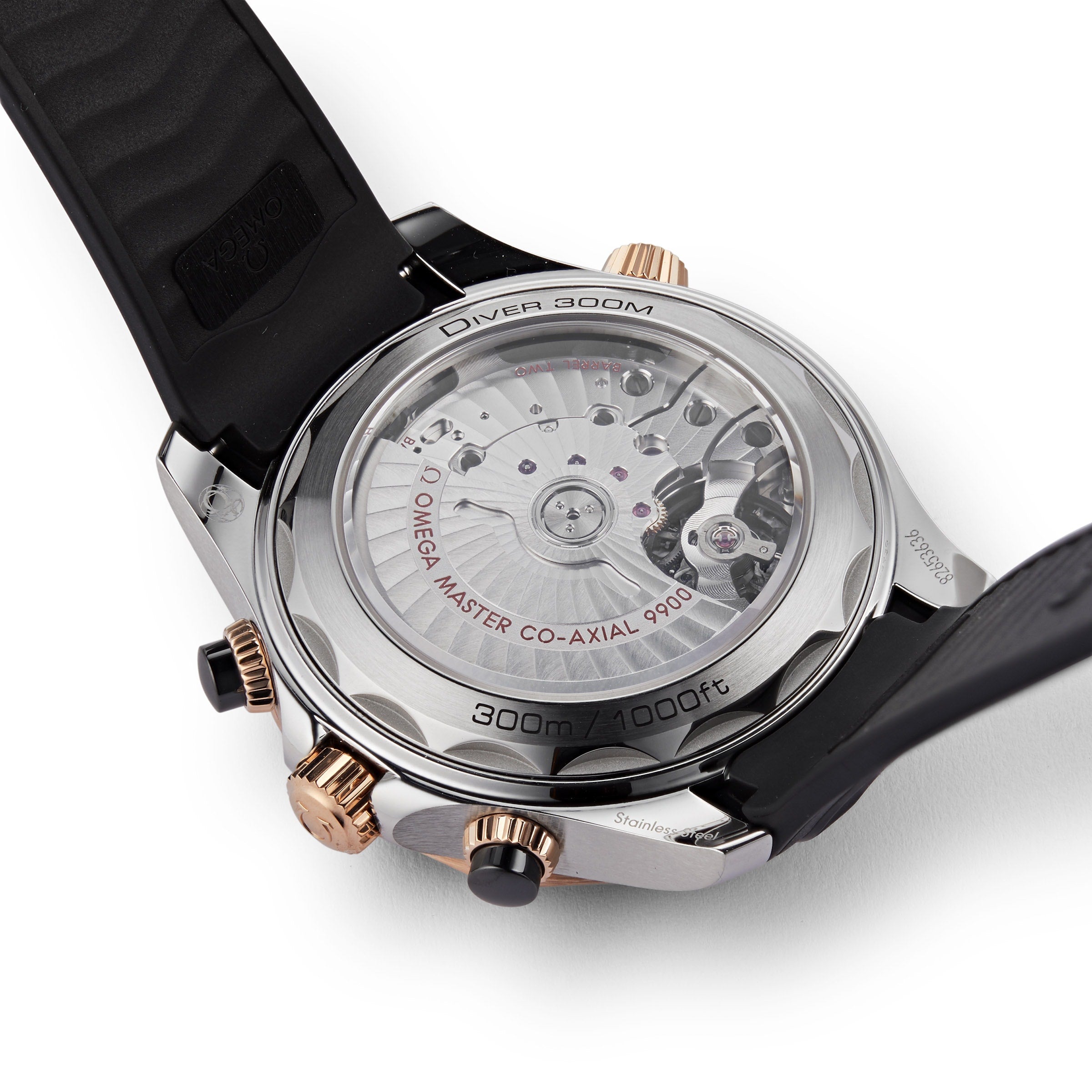 Close-up of the OMEGA Seamaster Diver 300M’s back, highlighting its transparent caseback, visible movement, and 300m/1000ft water resistance marking.