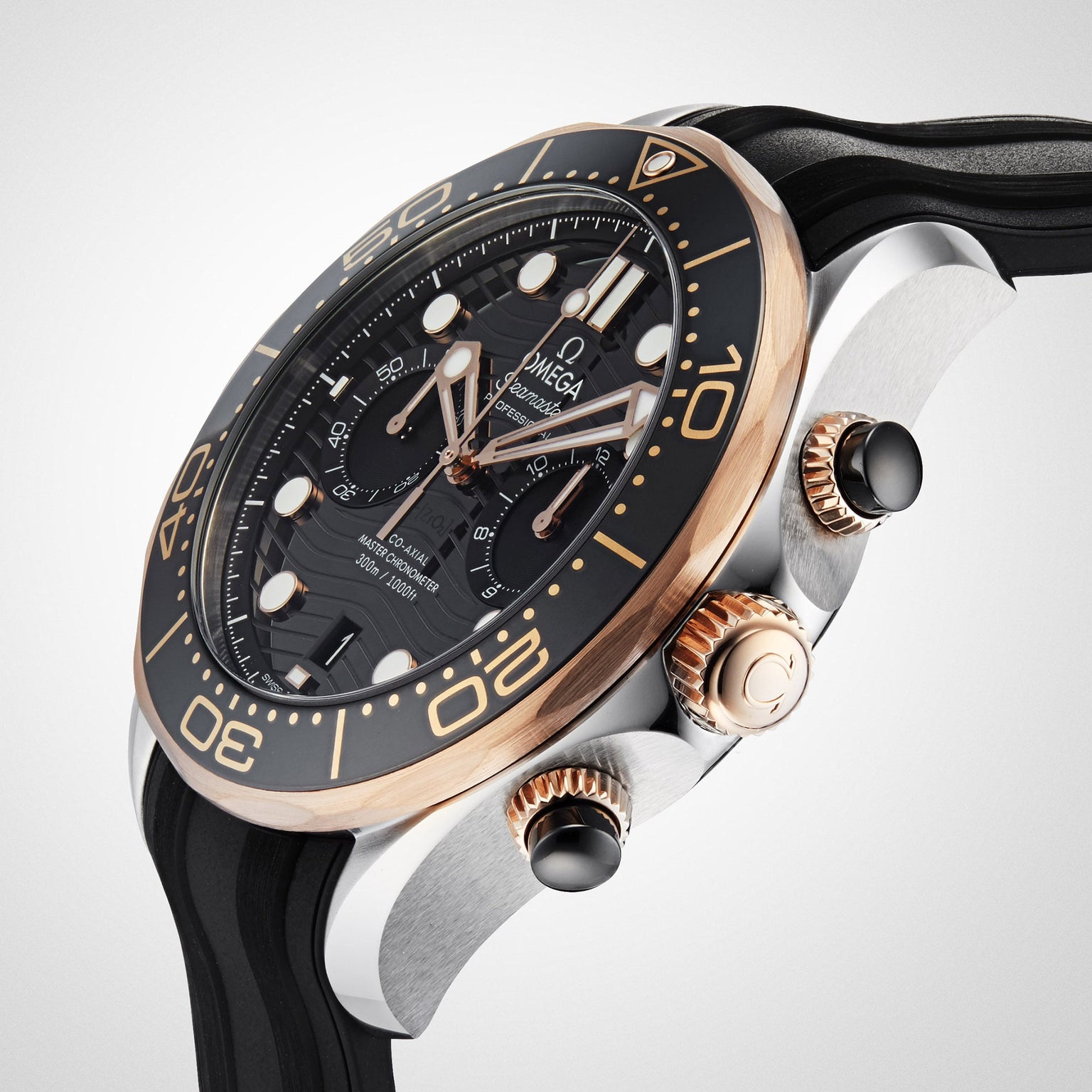A close-up of the OMEGA Seamaster Diver 300M, featuring a black and gold bezel, black dial, chronograph subdials, and sleek black rubber strap—a stylish dive watch reminiscent of the iconic James Bond timepiece.
