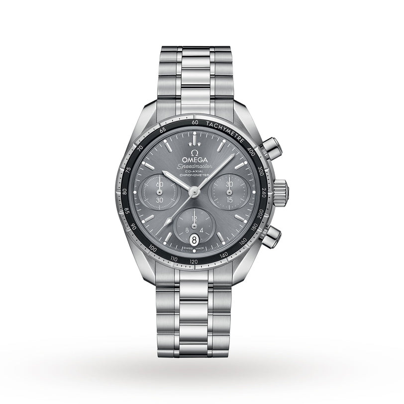 The OMEGA Speedmaster 38 is a stainless steel chronograph watch with a black dial, three subdials, 3330 calibre movement, date window at six o’clock, and a metal link bracelet.