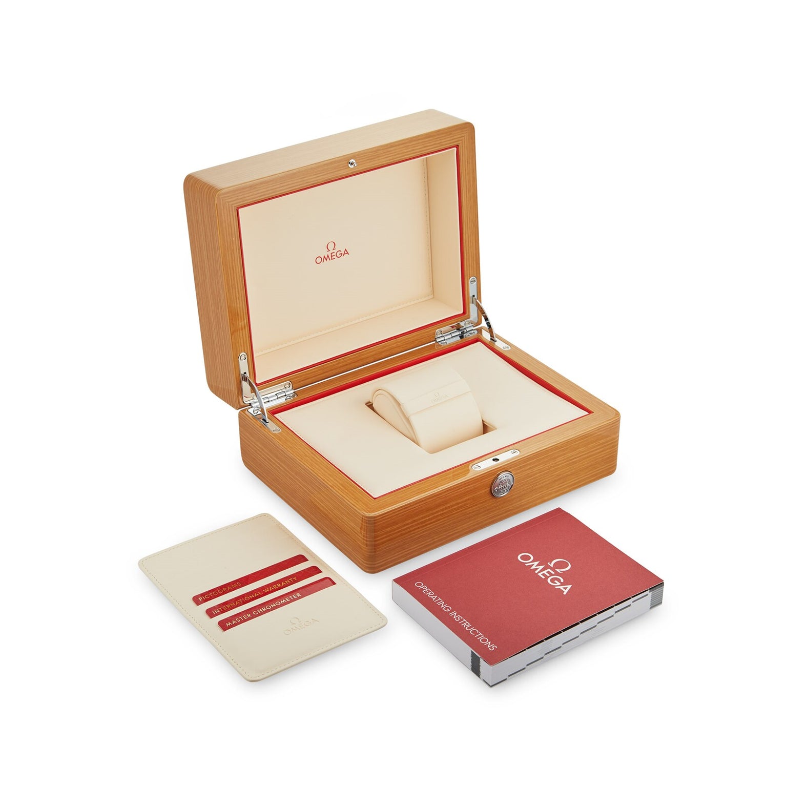 The OMEGA Constellation set features a wooden watch box with cream and red interior, a matching cream cardholder, and a red operating instructions booklet, all displayed on a white background.