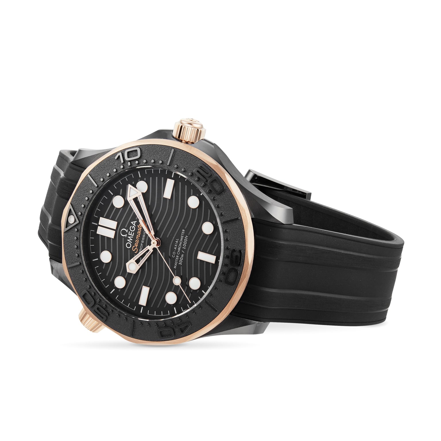 The OMEGA Seamaster Diver 300M features a black and rose gold case, black rubber strap, wave-patterned dial with white hour markers, and is powered by the OMEGA Calibre 8806, shown against a white background.