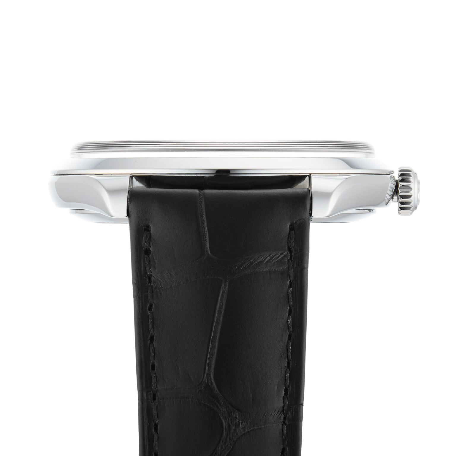 Side view of the OMEGA De Ville Trésor with a 40mm stainless steel silver-tone case, Co-Axial Master Chronometer movement, black leather strap with fine stitching, and visible crown.