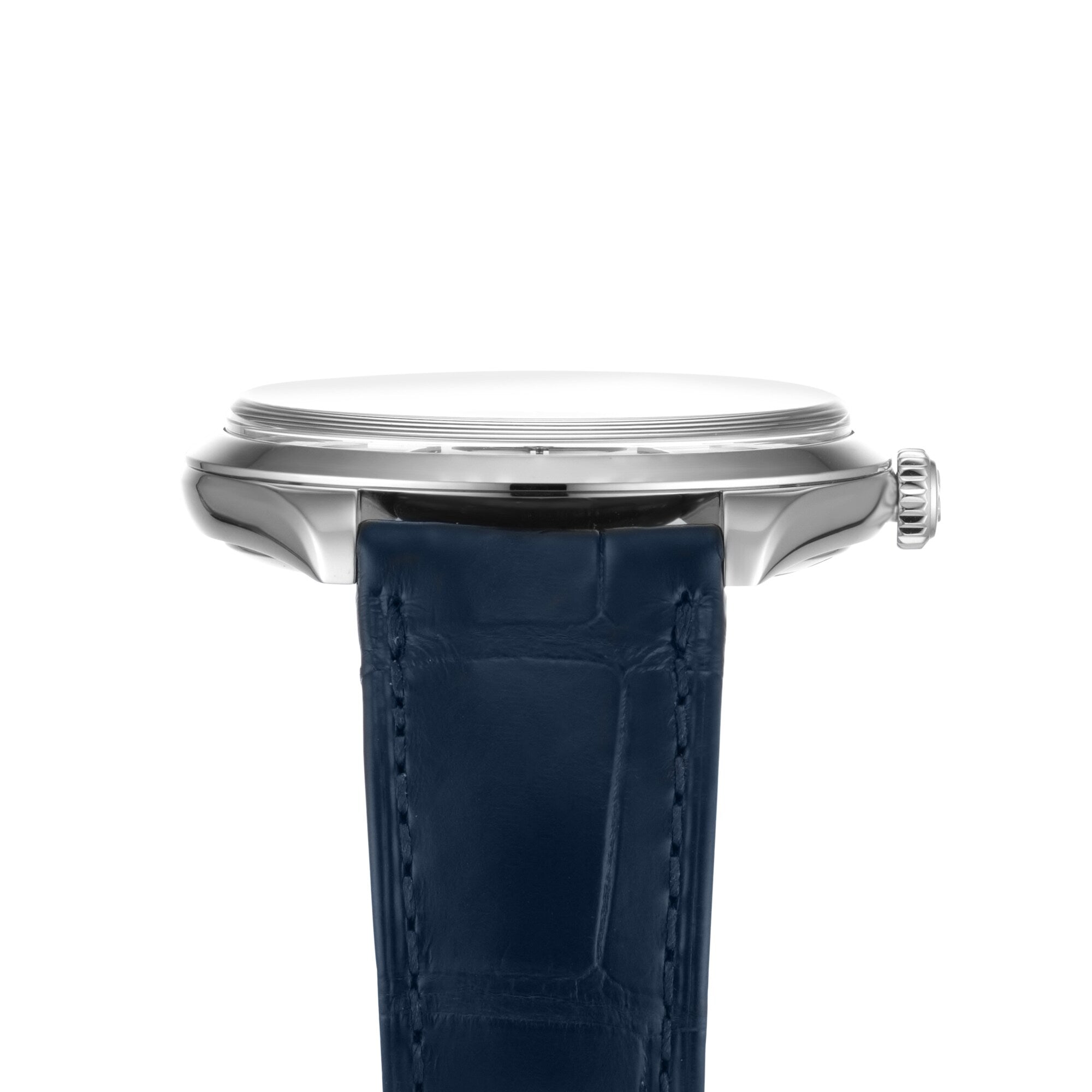 Side view of the OMEGA De Ville Trésor featuring a silver round case, right-side crown, and blue stitched leather strap, powered by the OMEGA Co-Axial Calibre 8926 Master Chronometer movement.