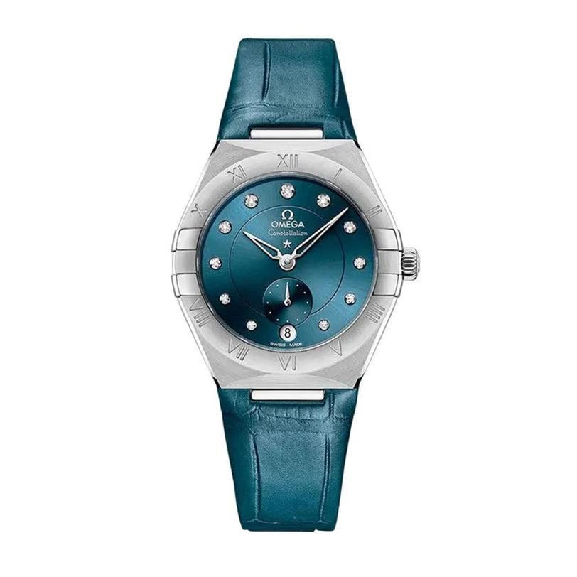 A teal OMEGA Constellation wristwatch with a peacock blue dial, diamond hour markers, Roman numeral bezel, and teal leather strap is shown on a white background. Its powered by the Co-Axial Master Chronometer Calibre 8802.