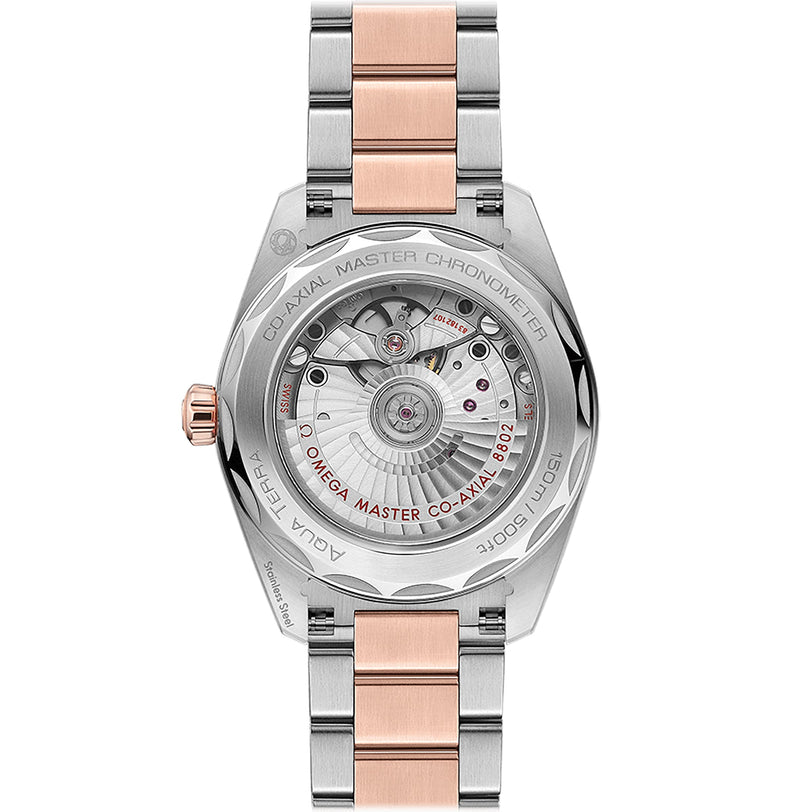 The OMEGA Seamaster Aqua Terra 150M showcases its master chronometer certified 8802 calibre through the caseback, paired with a striking two-tone silver and rose gold metal bracelet.
