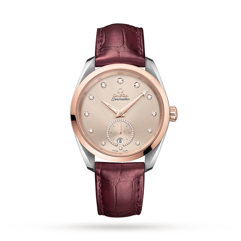 The OMEGA Seamaster Aqua Terra 150M is a luxury watch with a brown leather strap and a rose gold dial adorned with diamond hour markers.