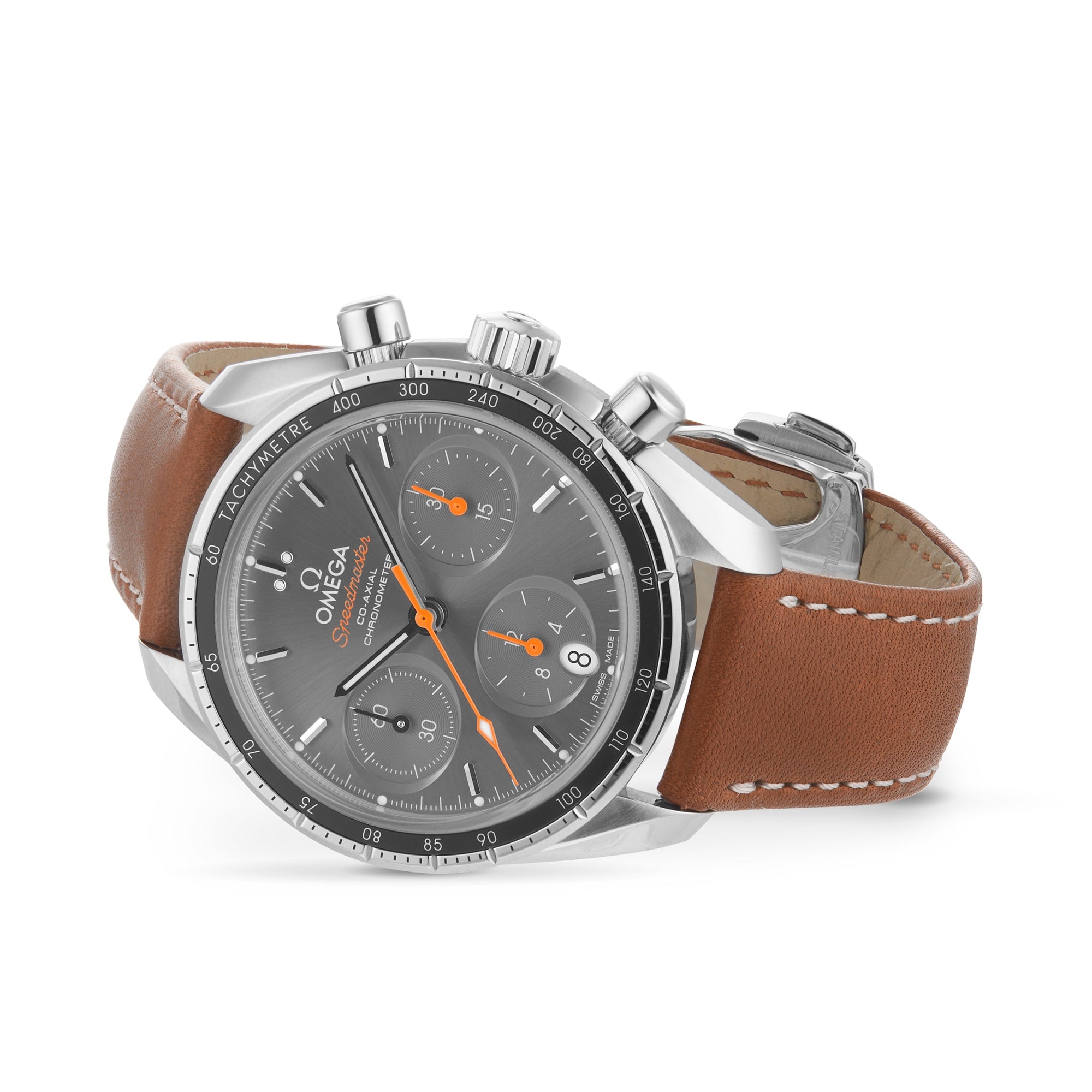 The OMEGA Speedmaster 38 features a stainless steel case, grey dial with orange accents, three subdials, and a brown leather strap with white stitching for a sporty and stylish look.