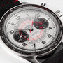 Close-up of an OMEGA Speedmaster Chronoscope featuring a silver dial, black tachymeter bezel, three sub-dials with red accents, and a black perforated leather strap in a 43mm stainless steel case.