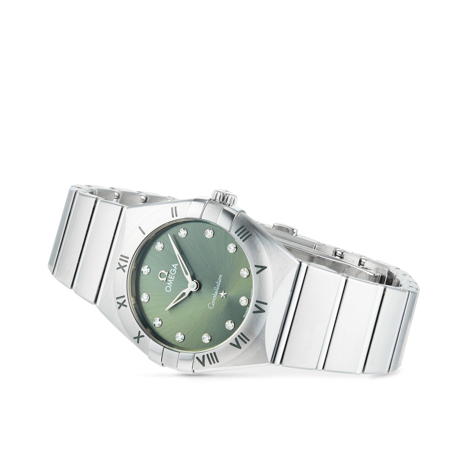 An OMEGA Constellation stainless steel wristwatch with a matcha green dial, diamond hour markers, and Roman numerals on the bezel is displayed at an angle against a white background.