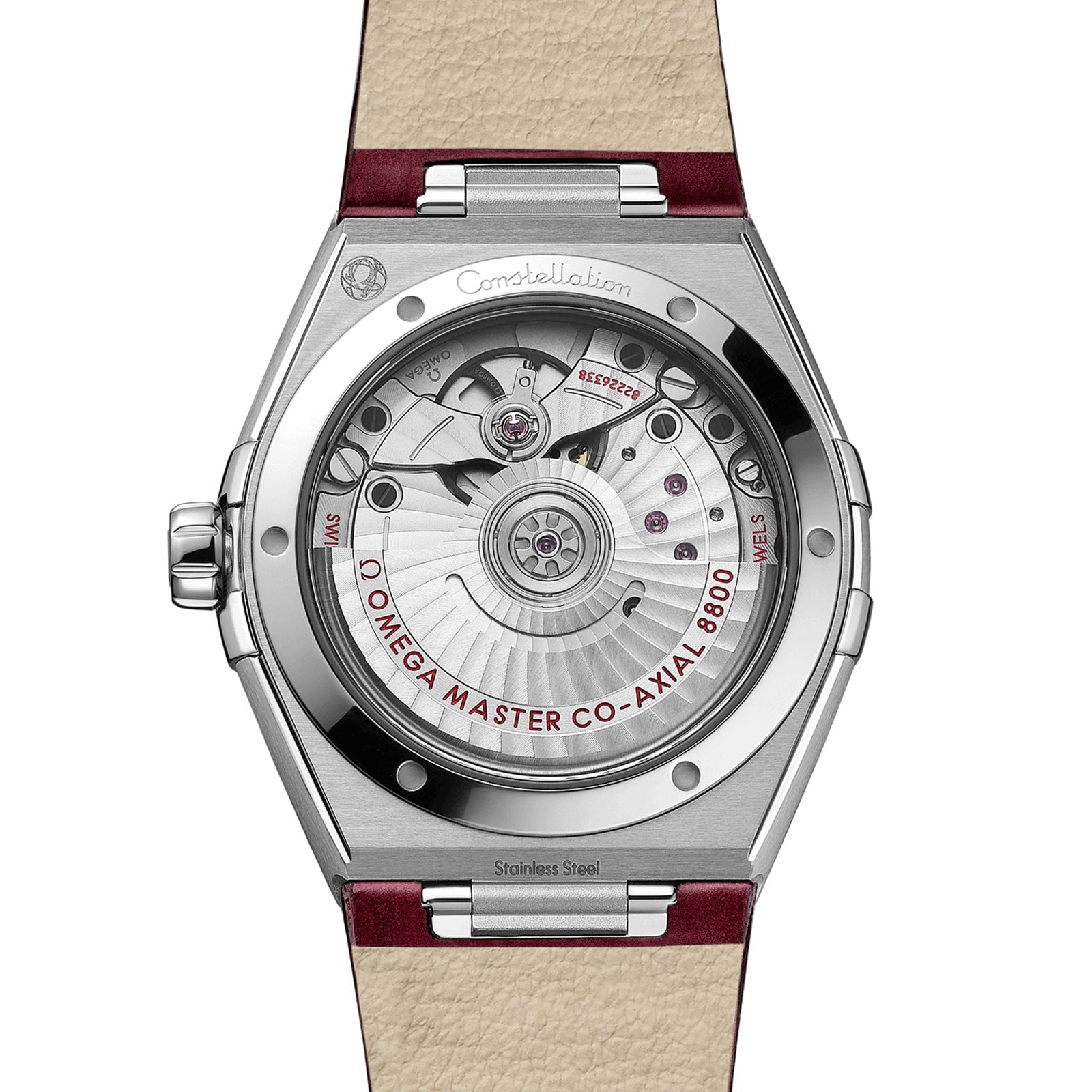 Close-up of the back of an OMEGA Constellation, revealing the Master Chronometer certified 8800 calibre movement with “OMEGA Master Co-Axial 8800” text in a stainless steel case.