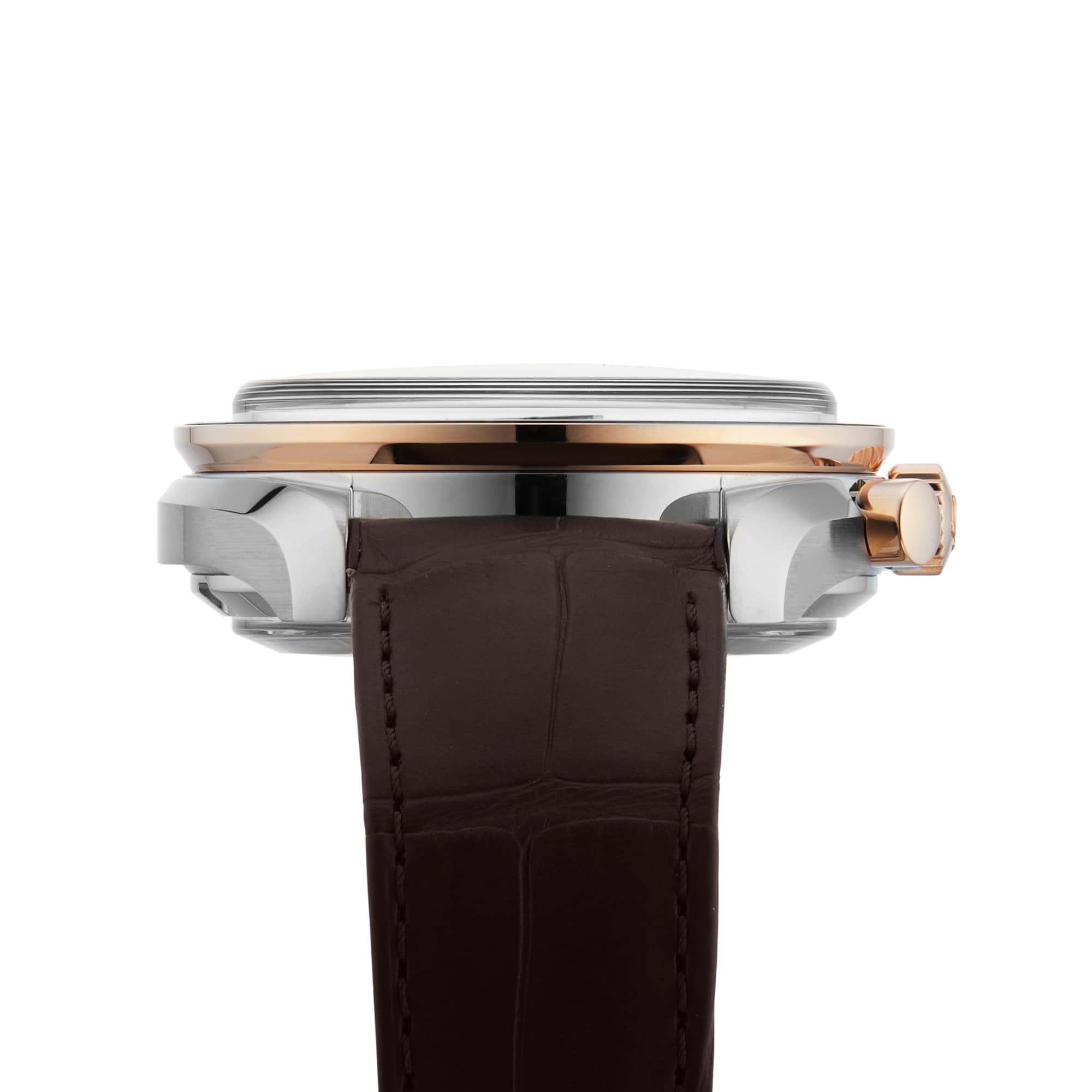 Side view of the OMEGA Speedmaster Moonwatch Co-Axial Chronograph with a 42.5 mm stainless steel and 18K Sedna™ gold case, brown leather strap, right-positioned crown, and realistic moon image on the dial.