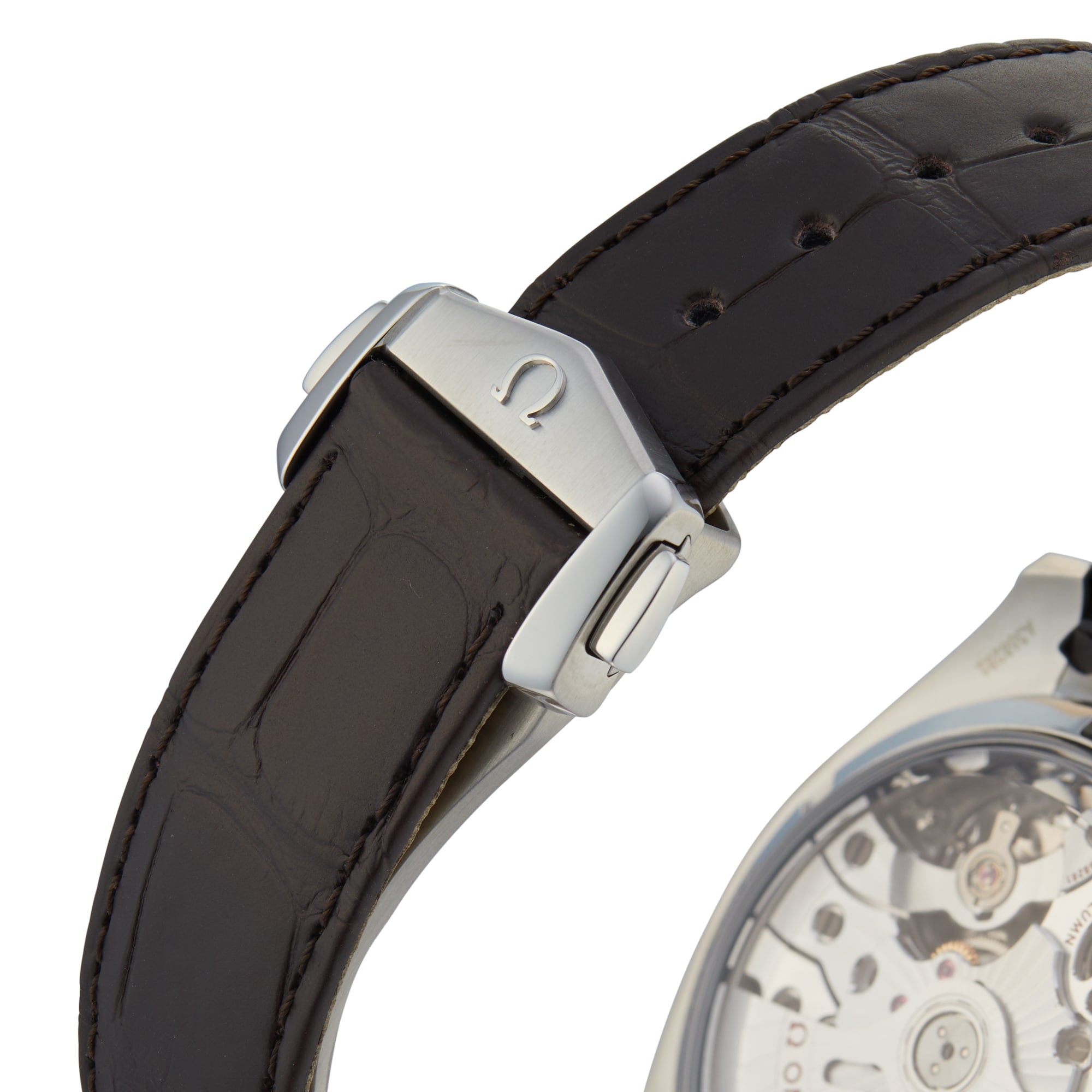 Close-up of a brown leather strap with a stainless steel OMEGA clasp, attached to the OMEGA Speedmaster Moonwatch Co-Axial Chronograph with visible movement and moonphase on its 42.5 mm stainless steel and 18K Sedna™ gold case.