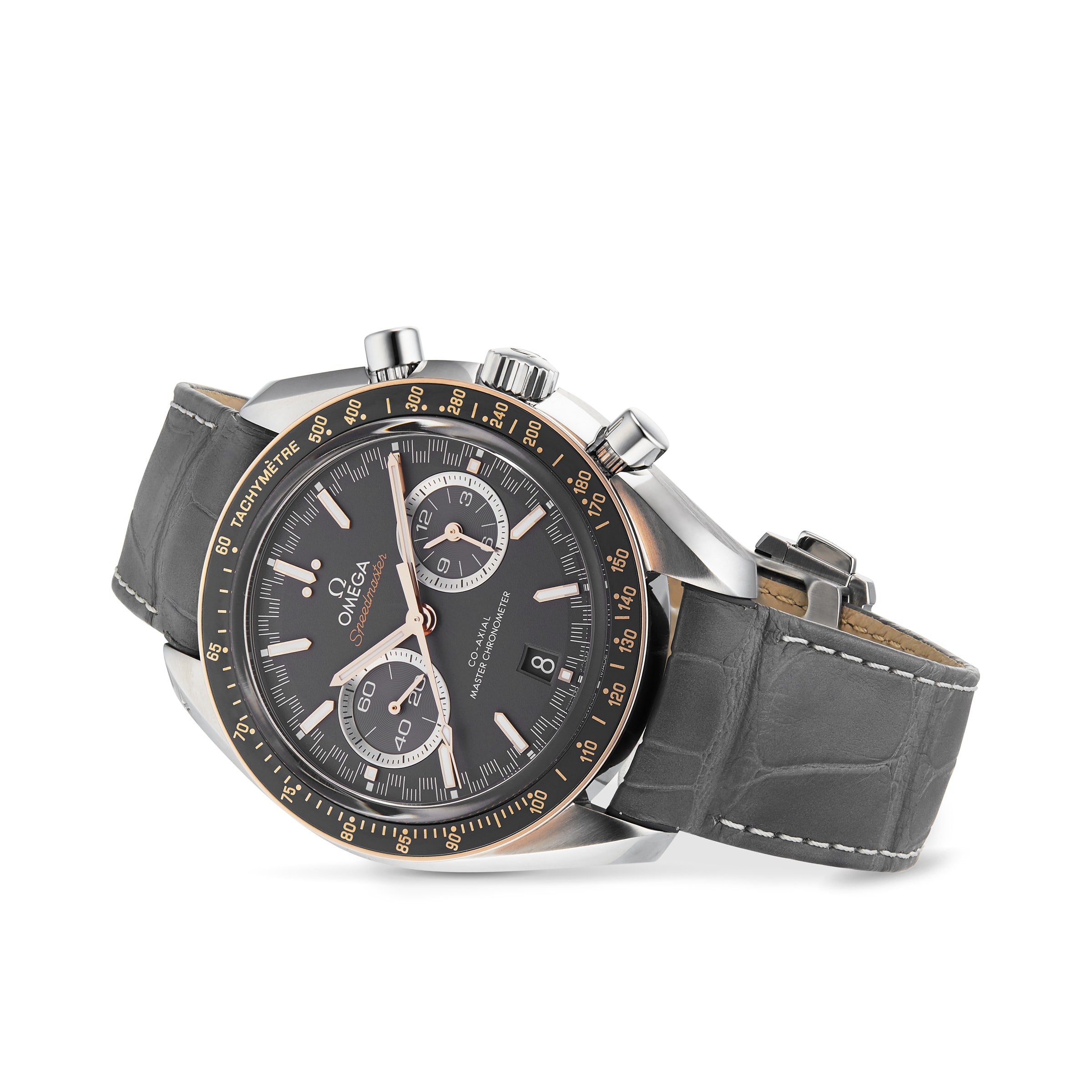 The OMEGA Speedmaster Racing, a luxury chronograph watch with a grey leather strap and black dial, is displayed at an angle.