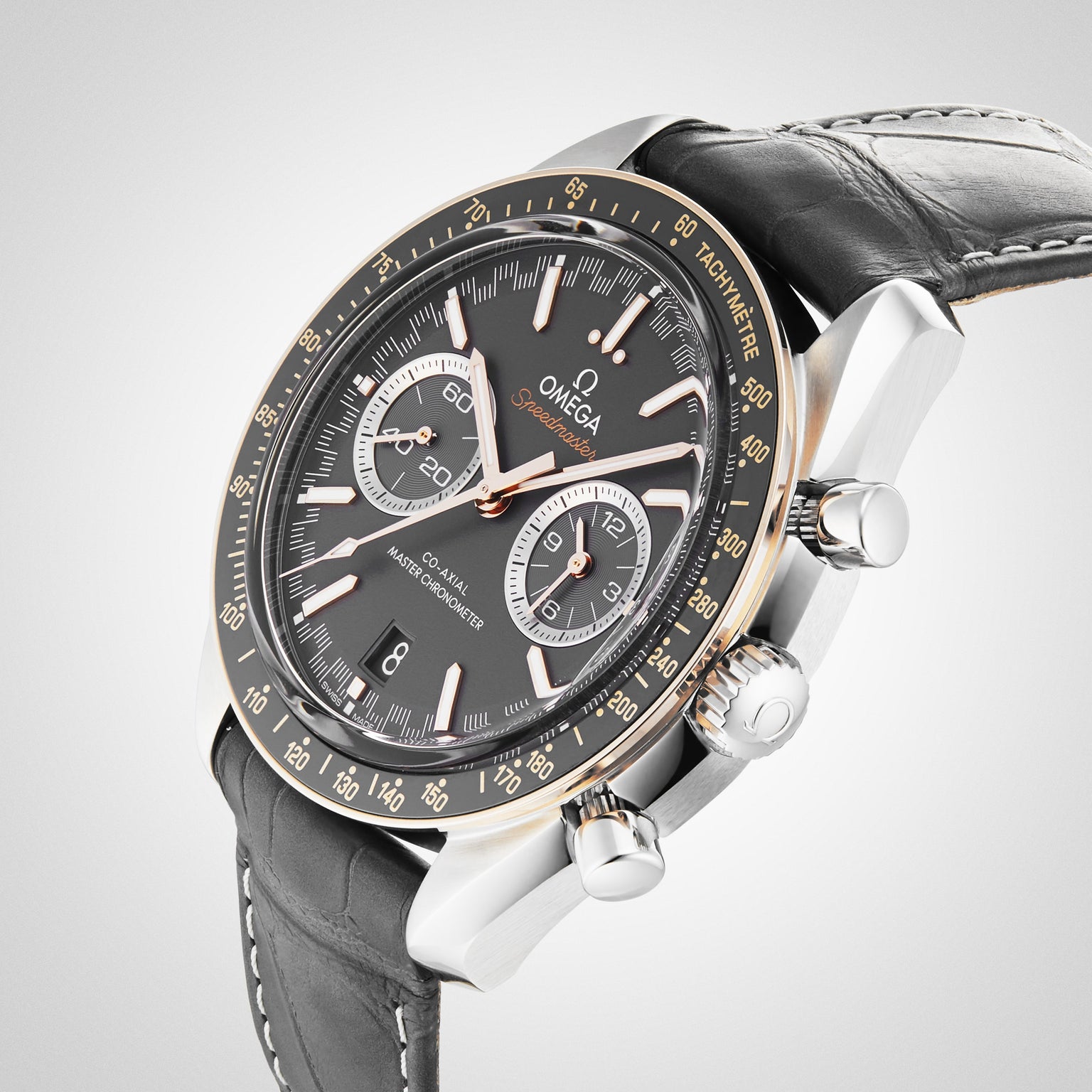 The OMEGA Speedmaster Racing is a luxury chronograph wristwatch with a black dial, leather strap, and three subdials.