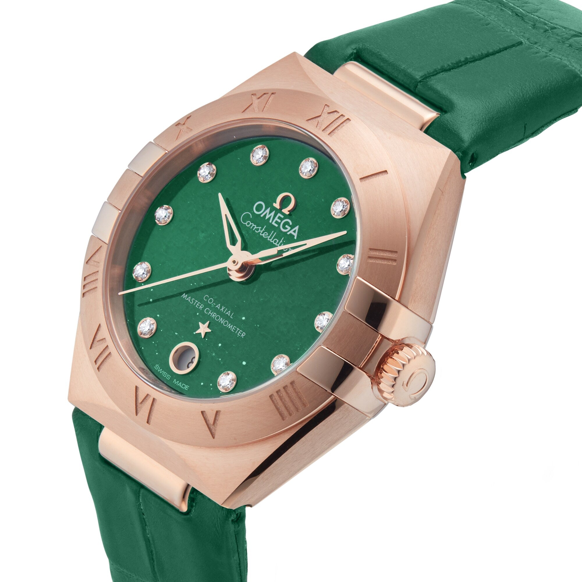 The OMEGA Constellation, crafted in 18K Sedna™ gold with a green dial, diamond hour markers, and a green leather strap, is elegantly showcased at an angle.