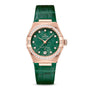 An OMEGA Constellation wristwatch featuring a green dial with diamond hour markers, a diamond bezel, and a green leather strap crafted in Sedna™ gold.