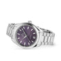 The OMEGA Seamaster Aqua Terra 150M features a stainless steel case, purple dial with silver markers, date at 3 oclock, and a metal bracelet—reflecting maritime heritage—shown on a white background.