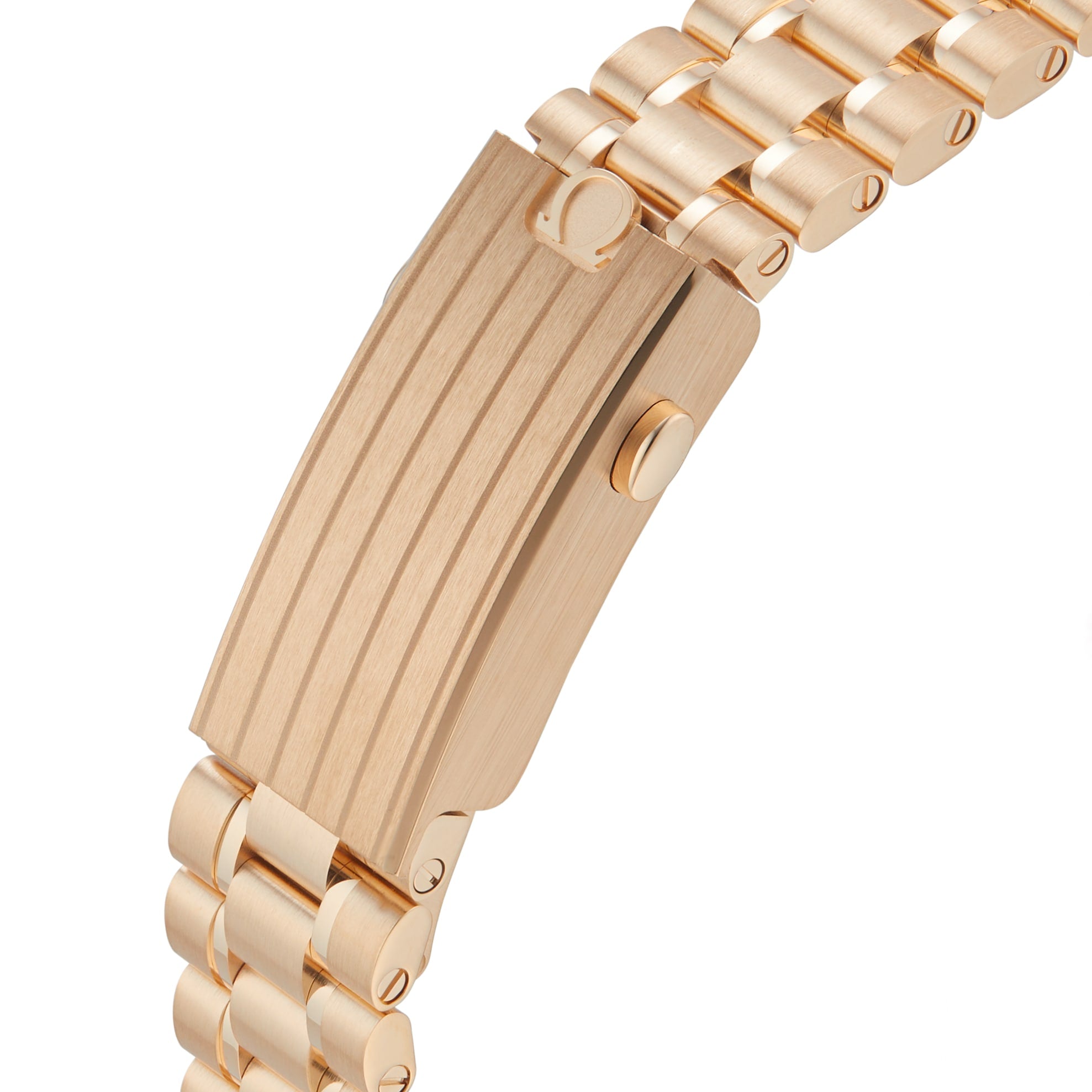 Close-up of the OMEGA Speedmaster Moonwatch Professional’s 18K Moonshine™ gold bracelet, showcasing grooved lines and a push-button clasp.