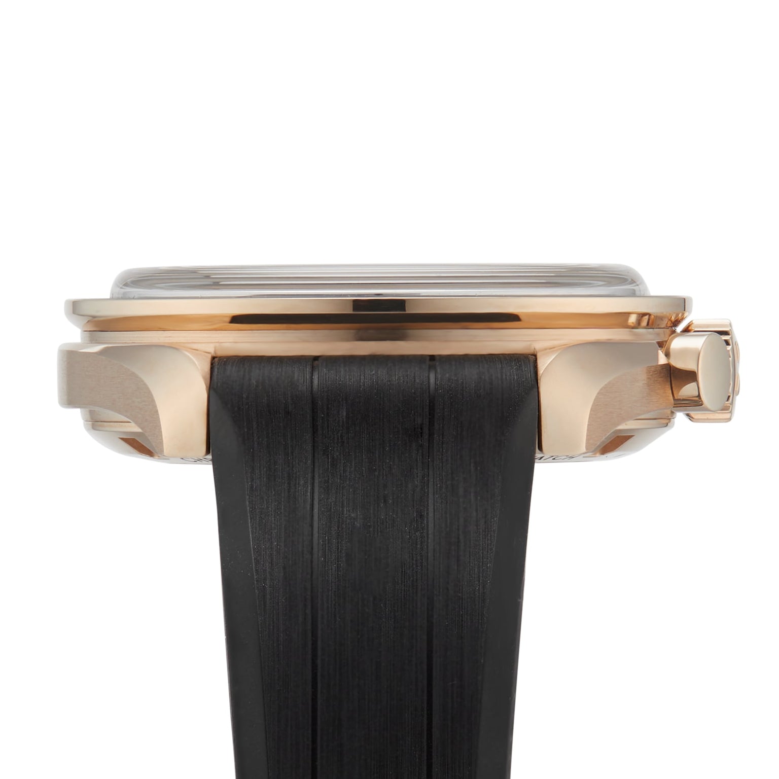 Side view of the OMEGA Speedmaster Moonwatch Professional, featuring a rose gold case, black rubber strap, and round crown—an elegant expression of the Co-Axial Master Chronometer.