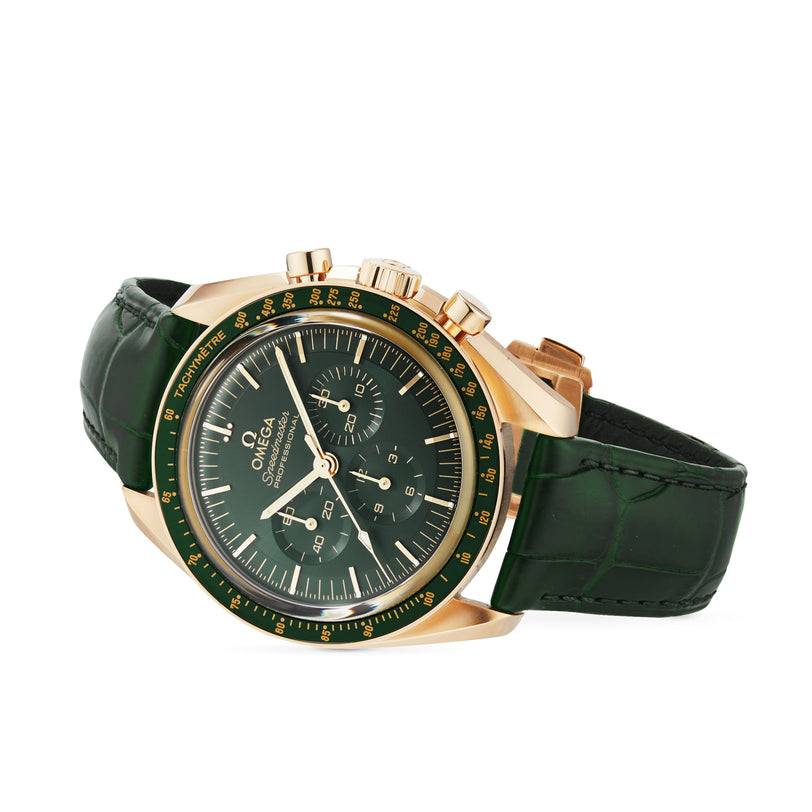 The OMEGA Speedmaster Moonwatch Professional in gold features a green dial with three subdials and a green leather strap, powered by the Co-Axial Master Chronometer movement, displayed against a white background.
