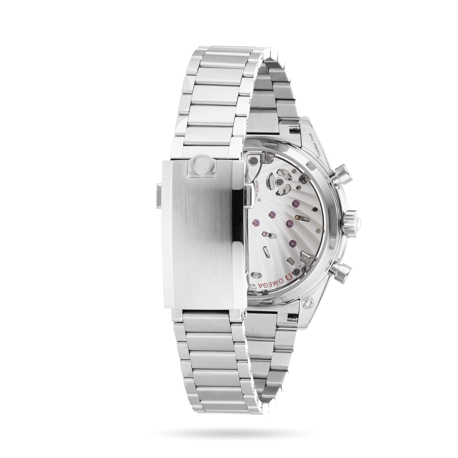 A close-up of the back of an OMEGA Speedmaster 57 watch, showcasing its stainless steel case, metal bracelet, and exposed mechanical movement.