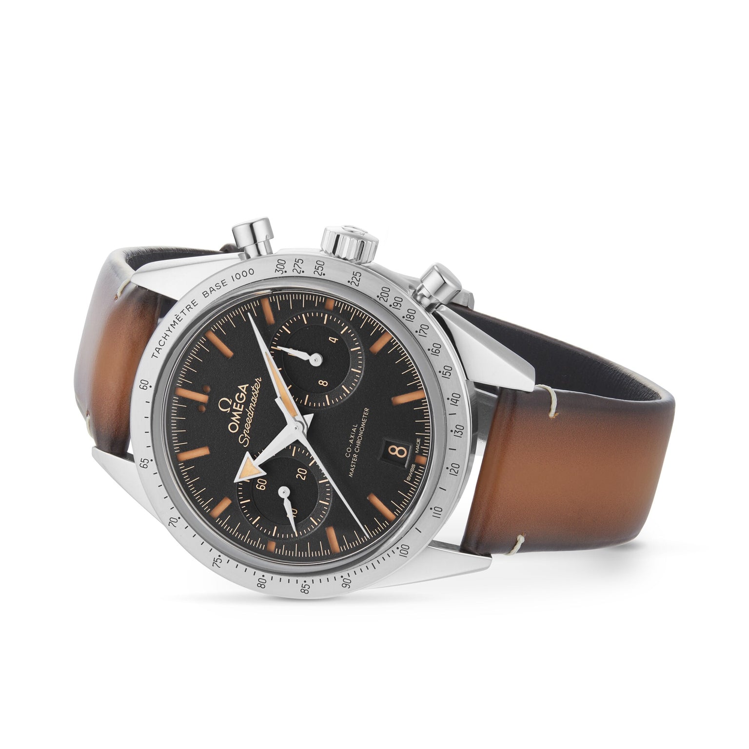 The OMEGA Speedmaster 57 is a stainless steel chronograph watch with a black dial, brown leather strap, and Master Chronometer 9906 calibre movement, shown at an angle.