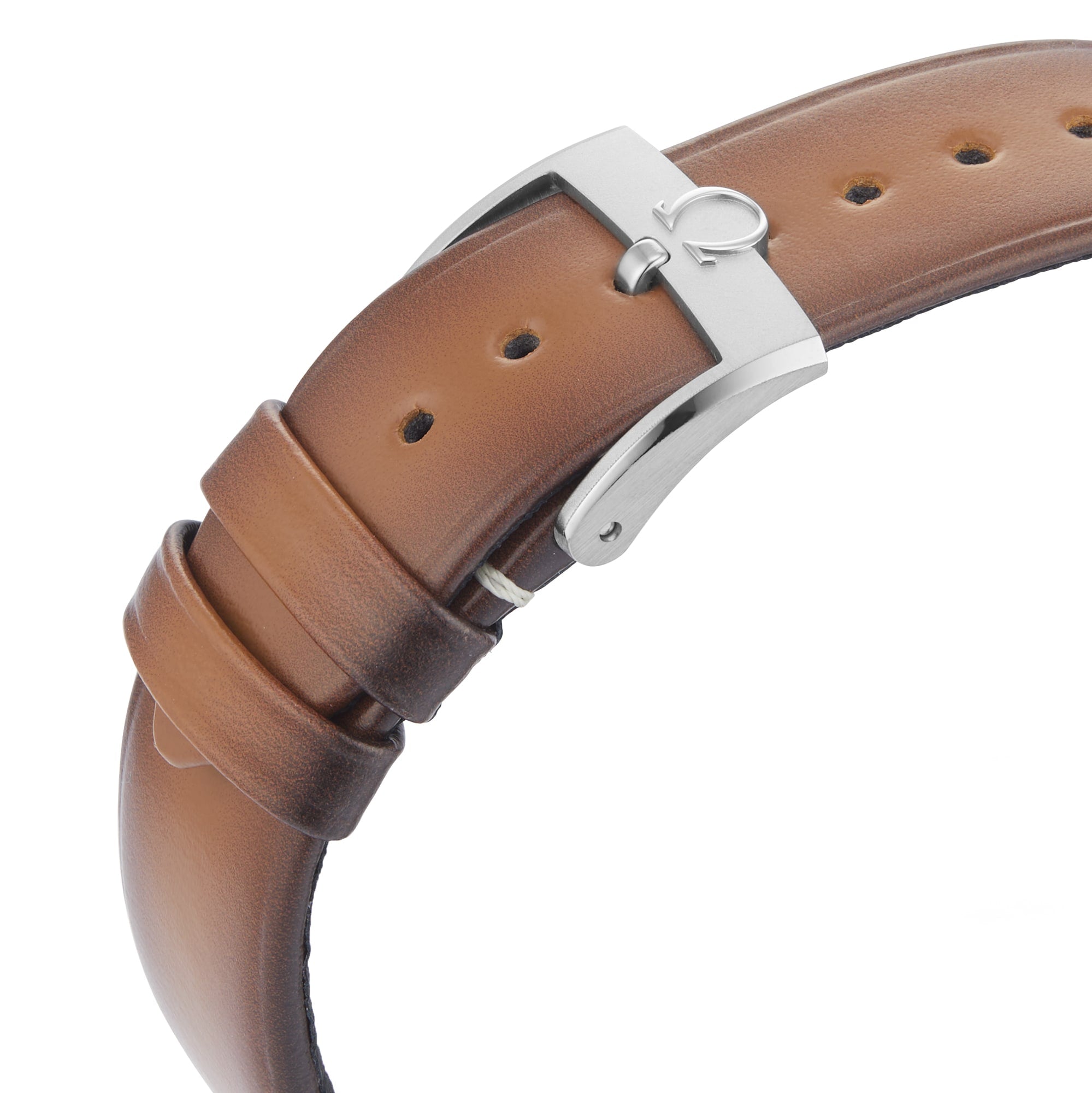 Close-up of a brown leather watch strap with a silver buckle and adjustment holes, crafted to complement the OMEGA Speedmaster 57 and its precise 9906 calibre movement.